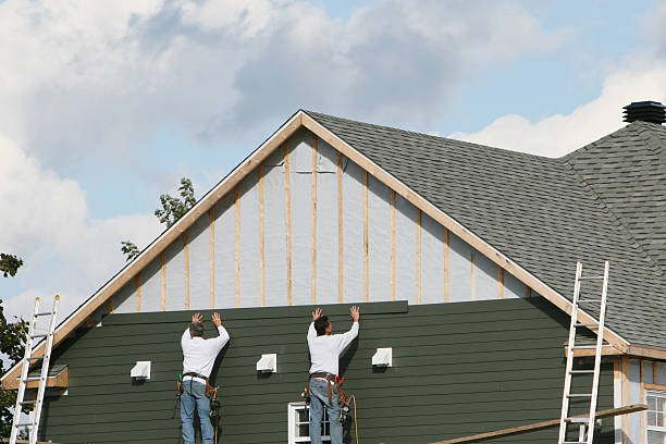 Professional Siding Installation technician working in Brownsville, IN